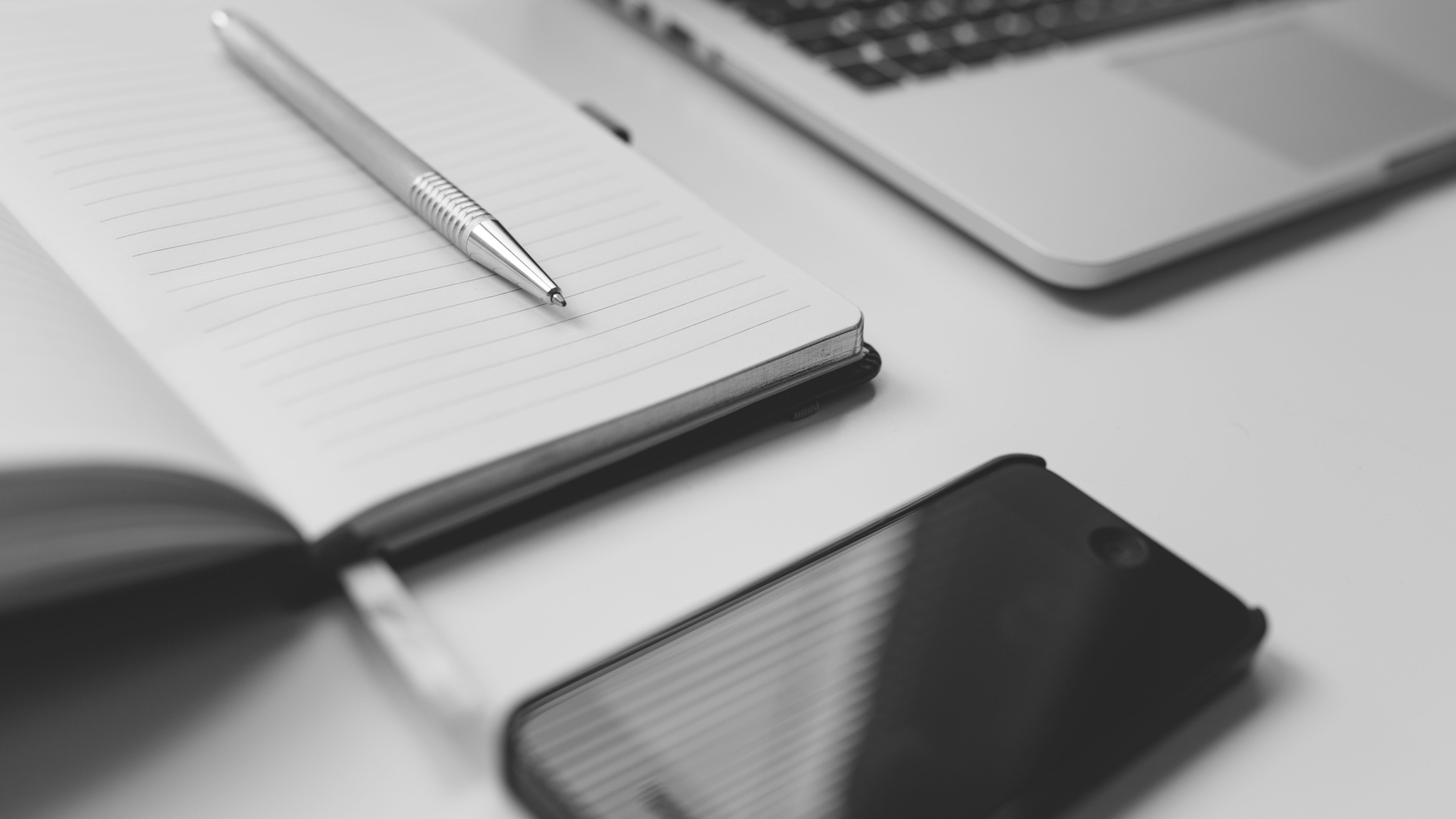 Penna, block och telefon